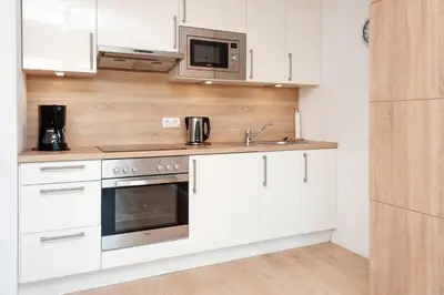 Küche/Küchenzeile in der Unterkunft Haus Hanseatic, Wohnung 112