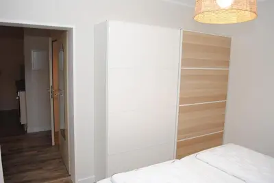 Ein Bett oder Betten in einem Zimmer der Unterkunft Haus Hanseatic, Wohnung 201