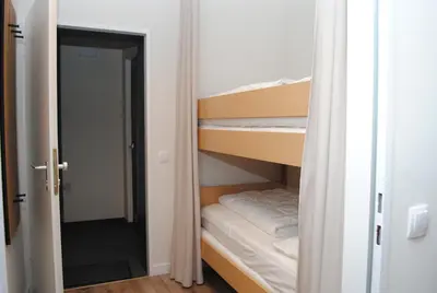 Ein Bett oder Betten in einem Zimmer der Unterkunft Haus Hanseatic, Wohnung 201