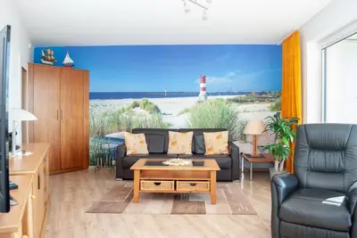 Ein Sitzbereich in der Unterkunft Haus Hanseatic, Wohnung 106