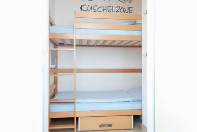 Ein Bett oder Betten in einem Zimmer der Unterkunft Haus Hanseatic, Wohnung 211