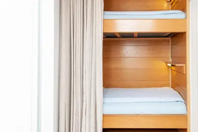 Ein Bett oder Betten in einem Zimmer der Unterkunft Haus Hanseatic, Wohnung 302