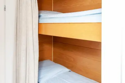 Ein Bett oder Betten in einem Zimmer der Unterkunft Haus Hanseatic, Wohnung 302