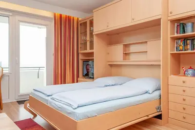 Ein Bett oder Betten in einem Zimmer der Unterkunft Haus Hanseatic, Wohnung 304
