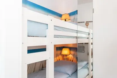 Ein Bett oder Betten in einem Zimmer der Unterkunft Haus Hanseatic, Wohnung 310