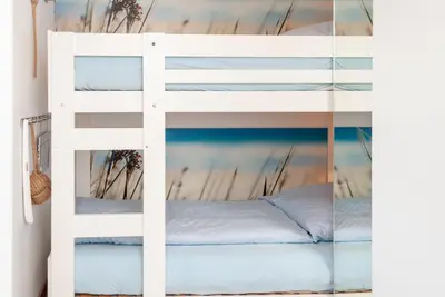 Ein Bett oder Betten in einem Zimmer der Unterkunft Haus Hanseatic, Wohnung 310