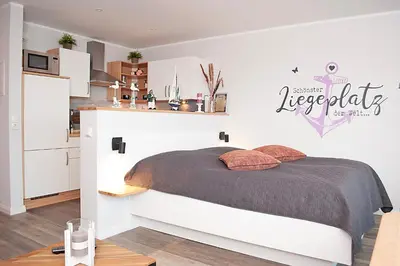 Ein Bett oder Betten in einem Zimmer der Unterkunft Haus Hanseatic, Wohnung 311
