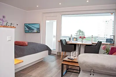 Ein Sitzbereich in der Unterkunft Haus Hanseatic, Wohnung 311
