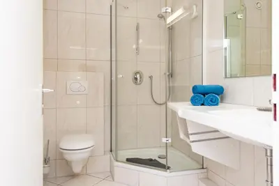 Ein Badezimmer in der Unterkunft Haus Hanseatic, Wohnung 406