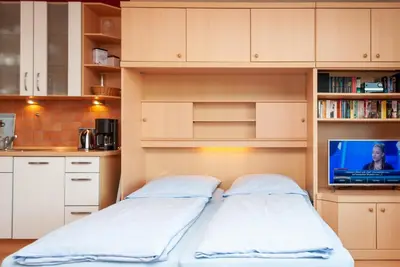 Ein Bett oder Betten in einem Zimmer der Unterkunft Haus Hanseatic, Wohnung 411