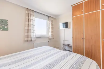 Ein Bett oder Betten in einem Zimmer der Unterkunft 