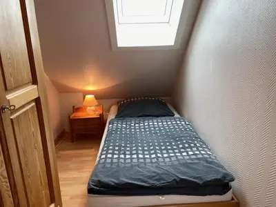 Ein Bett oder Betten in einem Zimmer der Unterkunft Haus Blaubär