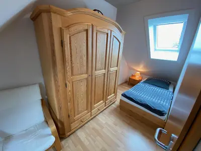 Ein Bett oder Betten in einem Zimmer der Unterkunft Haus Blaubär