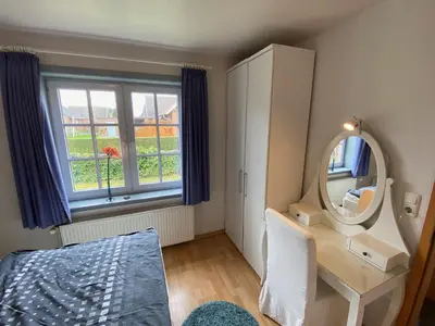 Ein Bett oder Betten in einem Zimmer der Unterkunft Haus Blaubär