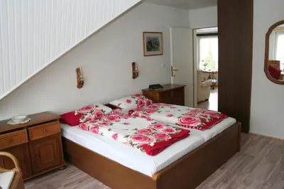 Ein Bett oder Betten in einem Zimmer der Unterkunft Schwiemann