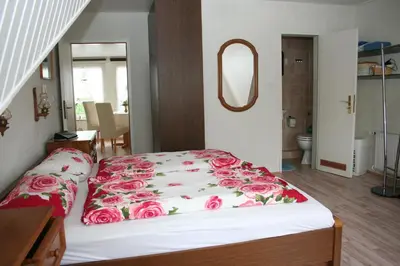 Ein Bett oder Betten in einem Zimmer der Unterkunft Schwiemann
