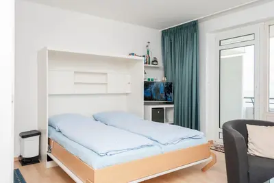 Ein Bett oder Betten in einem Zimmer der Unterkunft Haus Hanseatic, Wohnung 612