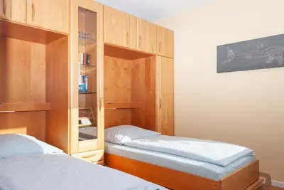Ein Bett oder Betten in einem Zimmer der Unterkunft Haus Hanseatic, Wohnung 801