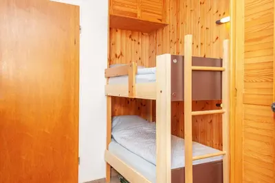 Ein Etagenbett oder Etagenbetten in einem Zimmer der Unterkunft Haus Hanseatic, Wohnung 702