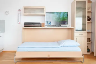 Ein Bett oder Betten in einem Zimmer der Unterkunft Haus Hanseatic, Wohnung 712