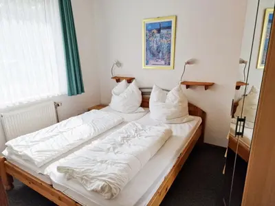 Ein Bett oder Betten in einem Zimmer der Unterkunft Steuermann