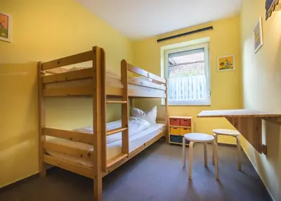 Ein Bett oder Betten in einem Zimmer der Unterkunft Hannoversche Str 50 FeWo EG