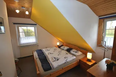 Ein Bett oder Betten in einem Zimmer der Unterkunft Medemstern II