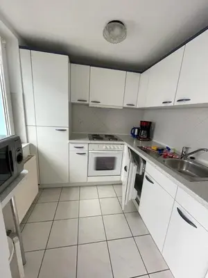 Küche/Küchenzeile in der Unterkunft Badehausallee 20 Bungalow