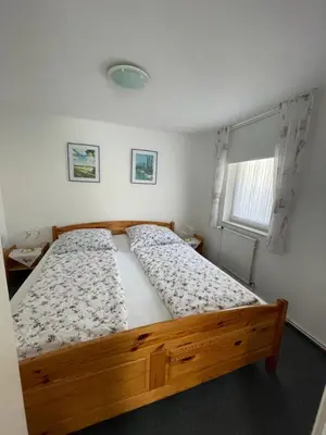 Ein Bett oder Betten in einem Zimmer der Unterkunft Badehausallee 20 Bungalow
