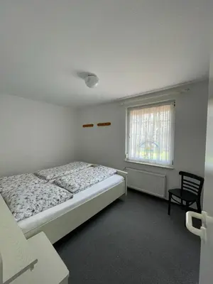 Ein Bett oder Betten in einem Zimmer der Unterkunft Haus Nordseegruß 3
