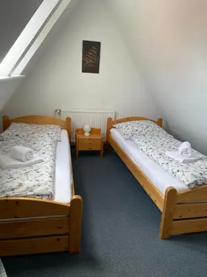 Ein Bett oder Betten in einem Zimmer der Unterkunft Haus Nordseegruß 2
