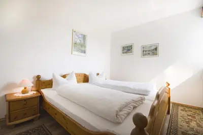 Ein Bett oder Betten in einem Zimmer der Unterkunft Frische Brise FeWo 06 01
