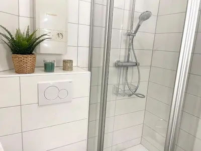 Ein Badezimmer in der Unterkunft Muscheleck EG