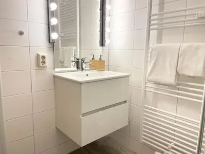 Ein Badezimmer in der Unterkunft Muscheleck EG