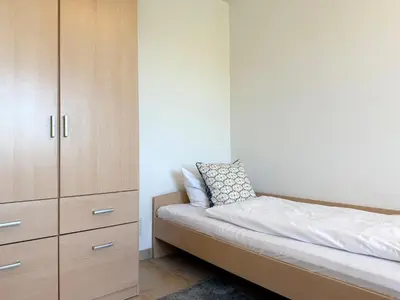 Ein Bett oder Betten in einem Zimmer der Unterkunft Haus am Waldbad Whg. 12/7