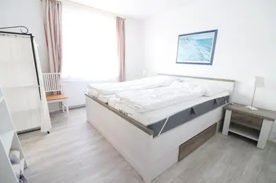 Ein Bett oder Betten in einem Zimmer der Unterkunft Haus Hachtmann