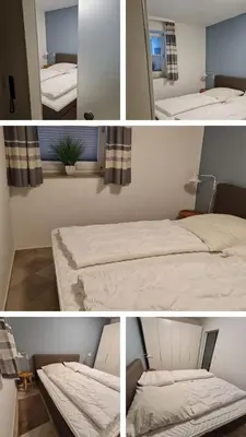 Ein Bett oder Betten in einem Zimmer der Unterkunft Nautilus, Ferienwohnung 5 inkl Strandkorb