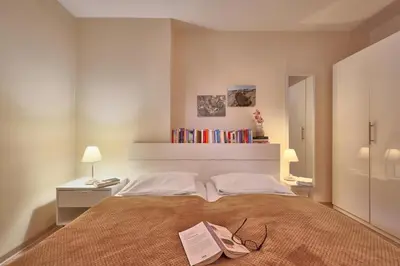 Ein Bett oder Betten in einem Zimmer der Unterkunft Nautilus, Ferienwohnung 13 inkl Strandkorb
