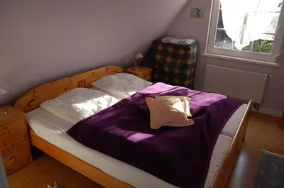 Ein Bett oder Betten in einem Zimmer der Unterkunft Christian-Brütt-Weg 42