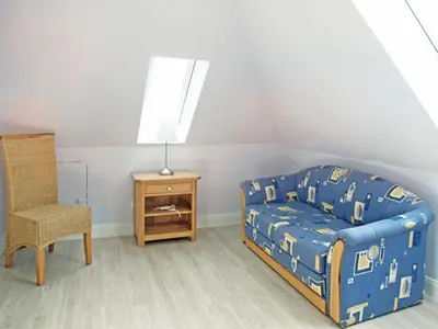 Ein Bett oder Betten in einem Zimmer der Unterkunft Haus Strandkrabbe, Seemöwe