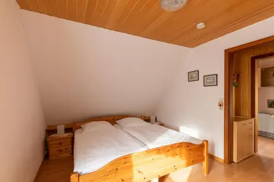 Ein Bett oder Betten in einem Zimmer der Unterkunft Wittdün
