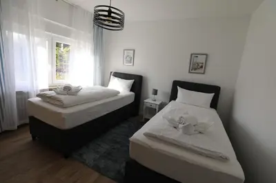 Ein Bett oder Betten in einem Zimmer der Unterkunft Rugenbargsweg 27 Whg 1